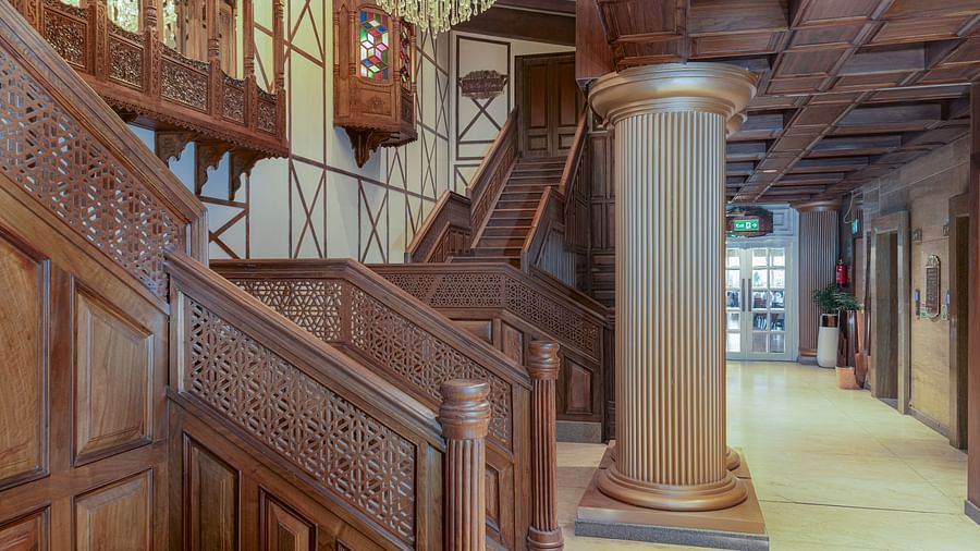 An image of a staircase made of wooden ascents leading to the other floors at our hotel - Sarovar Premiere, Srinagar